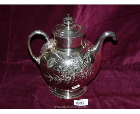 A white metal 'Royles Patented Self Pouring' teapot with floral engraved decoration.