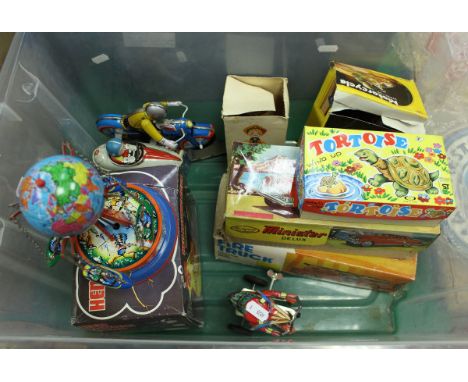 A collection of ten various tin plate clock work and traction toys including a Minister Delux car, Japanese wind-up tortoise,