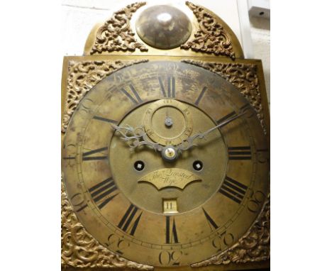 An 18th Century oak cased long case clock, the eight day movement with brass arch dial, Arabic and Roman Numerals enclosing a