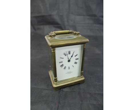 A circa 1900 French lacquered brass cased carriage clock, the dial with Roman numerals inscribed "Examd by Mappin &amp; Webb 