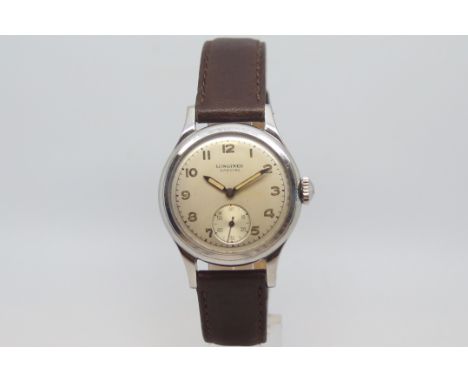 Vintage Longines special, circular dial with Arabic numerals, outer minuet track, stepped bezel, 33mm stainless steel case, s