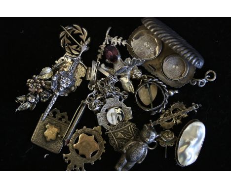 A quantity of mostly antique and unusual silver items including a silver bear and fobs, weighing approximately 162g gross