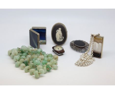Selection of silver and costume jewellery including a Wedgwood brooch, a Ralco watch clip, a necklace, brooch and two bead ne