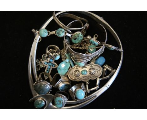 A quantity of mostly turquoise set jewellery including rings, pendants and bangle, weighing approximately 394g gross