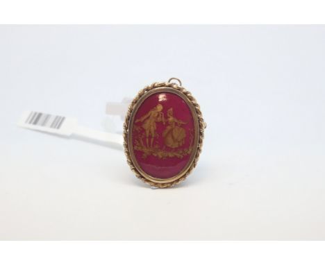 Enamel porcelain oval brooch, red enamel background with gold on top depicting a lady, with a gentleman kissing her hand, wit