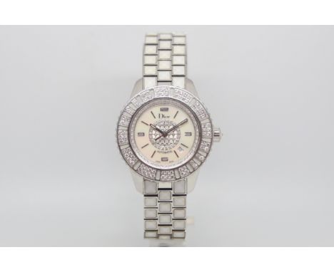 Dior Christal diamond set dress watch, mother of pearl and diamond set dial, diamond and mother of pearl bezel, 34mm stainles