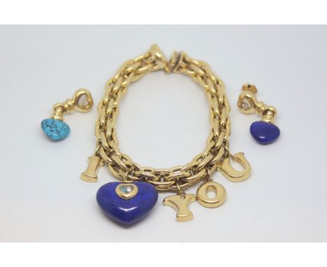 Chopard charm bracelet and earring set, heavy gold link bracelet with gold charms, large carved Lapis Lazuli heart charm set 