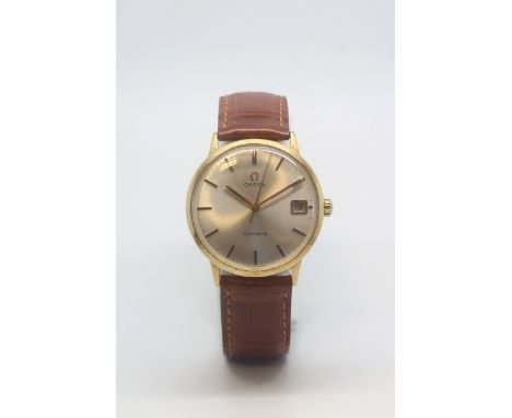 Gentlemen's 14ct Omega Geneve, mechanical movement with date at 3 o'clock, silvered dial with baton onyx hour markers, 35mm 1