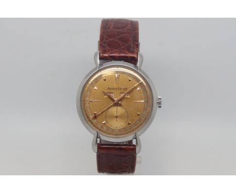 Vintage Jaeger-LeCoultre triple calendar, circular dial with day and month apertures, dagger hour markers, outer date track w