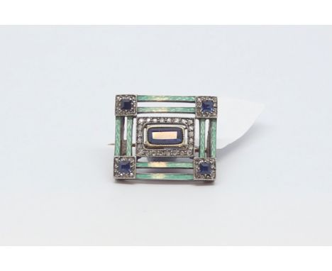 An enamel and sapphire brooch with diamond details. Likely Russian in origin. 19 x 16 mm.