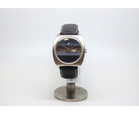 Vintage Enicar automatic, circular blue radiant dial, day and date aperture, stainless steel cushion case, screw down case ba