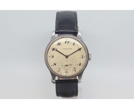 Rare Oversized Gentlemen's Longines, circa 1940s, Arabic dial with sweeping sub second hand, black hands, manual wind glided 