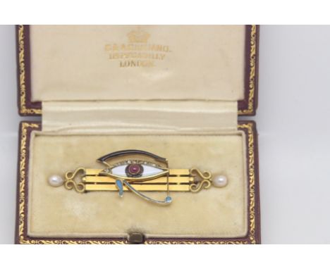 Antique Egyptian revival Eye of Horus brooch, red cabochon centre with white, black and blue enamel, rose cut diamond detail,