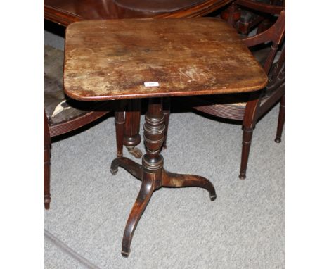 A 19th Century mahogany rectangular snap top occasional table, raised on a turned baluster column and tripod base, 58cm