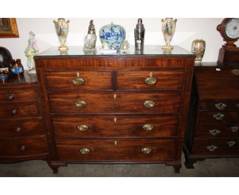 A George III mahogany chest, of large size, fitted two short and three long graduated drawers, raised on bracket feet, 130cm 