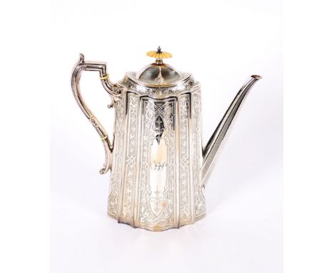 A Victorian electro plated coffee pot, having foliate engraved decoration and ivory finial to the lid, 27cm