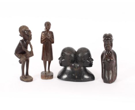 A well carved ebony double headed group; another of a native lady carrying a baby on her back; another similar; and another o