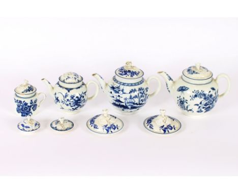 An 18th Century Worcester blue and white teapot, having floral and butterfly decoration, the domed lid with flowerhead finial