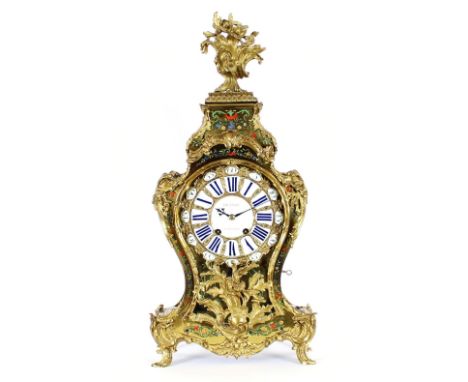 A 19th Century French ormolu cut brass and enamel decorated bracket clock, the circular enamel dial with blue Roman numerals,