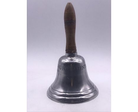 A reception hand bell 'Ring for Attention'