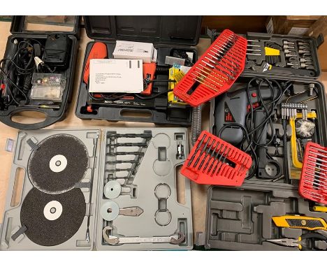 A selection of power tools and accessories including a staple gun 