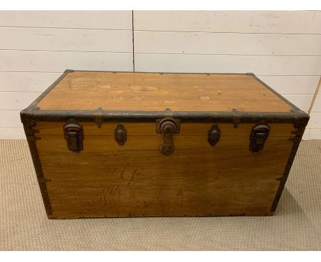 A Large Brass Banded Travel trunk (W 107 cm x D 59 cm x H 53 cm)