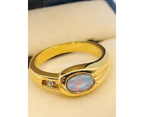 An Australian Opal ring, untested gold metal setting. (Ring size K)