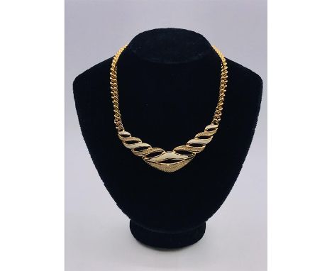 A Christian Dior vintage necklace and earring set in original box