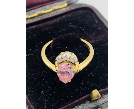 A 14 ct gold ring with heart shaped pink stone