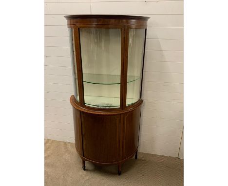 A bow fronted display cabinet with string inlay (H184cm W95cm D45cm)