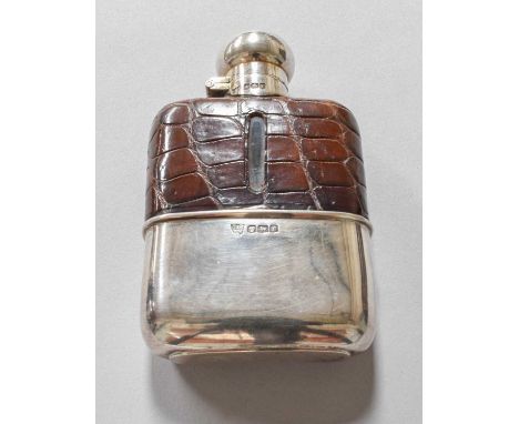 A George V Silver-Mounted Glass Hip-Flask, by G. and J. W. Hawksley, Sheffield, 1923, the glass body curved oblong, the base 