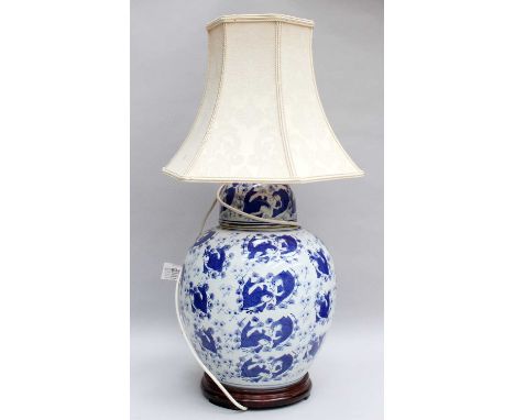 A Chinese Porcelain Ginger Jar and Cover, mounted as a table lamp, 20th century, painted in underglaze blue with fish and aqu