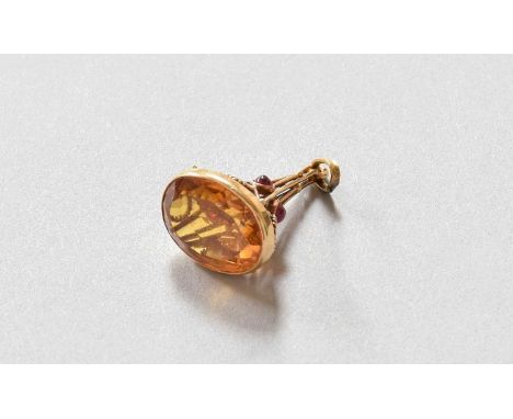 A French Gold Mounted Citrine and Synthetic Ruby-Seal Fob-Seal, with wirework sides and suspension ring, 38mm high