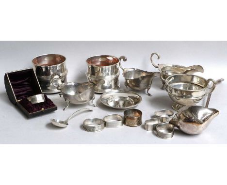 A Collection of Assorted Silver, including a set of four Elizabeth II silver wine-coasters; three differing sauceboats; a two