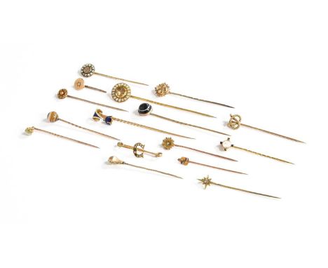 Fifteen Stickpins, including enamel examples, diamond examples, split pearl examples, a moonstone example; quartz examples et