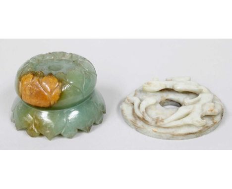 A Chinese Jade Disc, carved with a mythical beast, 7.5cm; together with A Further Chinese Carving of a lotus blossom (2)Disc 