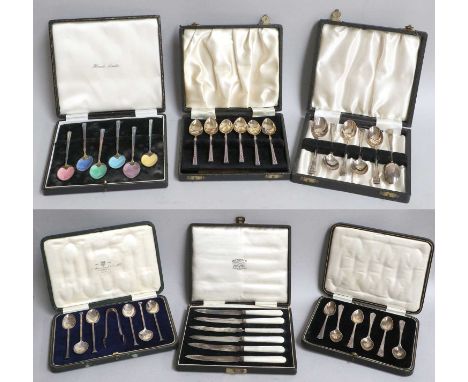 A Collection of Assorted Cased Silver Spoons, including four cased sets of six teaspoons, two decorated with enamel and a cas