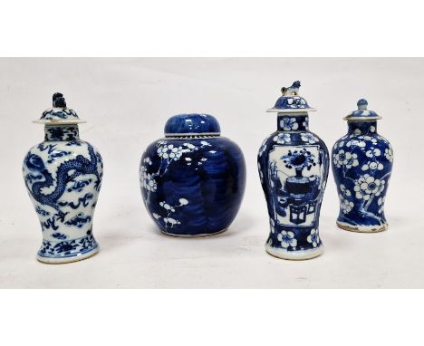 Three various 19th century Chinese porcelain inverse baluster vases and covers, underglaze blue decoration of dragon, flowers