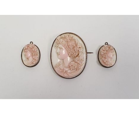Carved pale pink shell cameo brooch, oval, female bacchanalian profile and pair smaller pendants (3) Condition ReportNeed a g