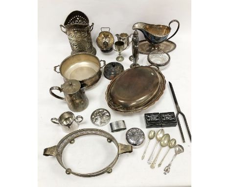 Quantity of EPNS to include sauce boat with integral oval tray, two-handled bottle coaster, pierced, pair tall pepperettes, q