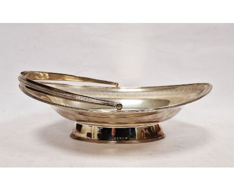 George III silver swing-handled cake basket of navette form, armorial to the centre, William Allen III, London 1801, 33ozt Co