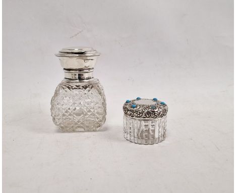 Silver and turquoise-coloured glass dressing table bottle marked 'Sterling' and a glass dressing table bottle with silver cap