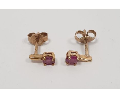 Pair of 9ct gold and ruby earrings, approx. 1.0g total 