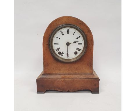 Walnut veneered mantel clock in arch case, on bracket feet, Roman numerals on white enamelled circular dial
