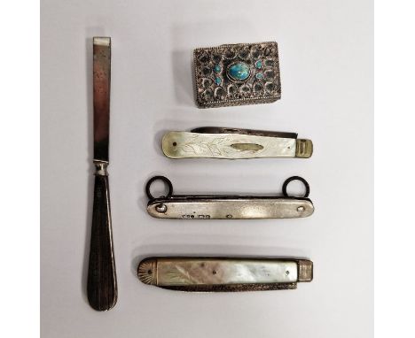 Two silver-plated and mother-of-pearl handled folding fruit knives, further folding silver-handled knife, a white metal patch