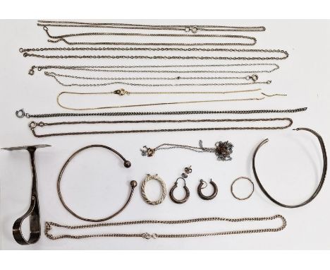 Silver and white metal ware to include silver food pusher, a white metal torque-style bangle, chains, earrings, etc (1 tray) 