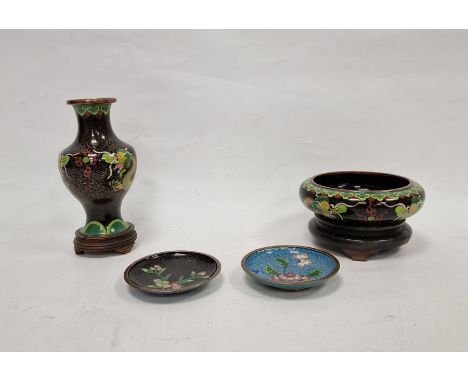 20th century Chinese cloisonne enamel bowl, black ground, incurved rim, dragon decorated, 15cm diameter and the hardwood stan