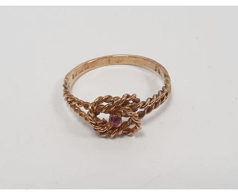 9ct gold ring set with pinhead size ruby, 1.6g