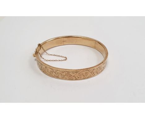 9ct gold bangle, engine-turned and foliate scroll engraved, 12g approx. 