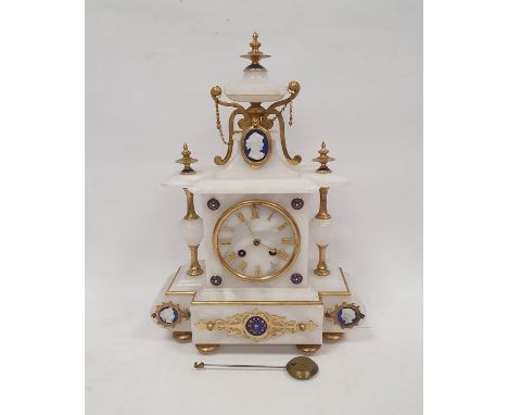 Ornately decorated white onyx mantel clock with blue and gold enamel medallions, turned brass and onyx columns topped with ur